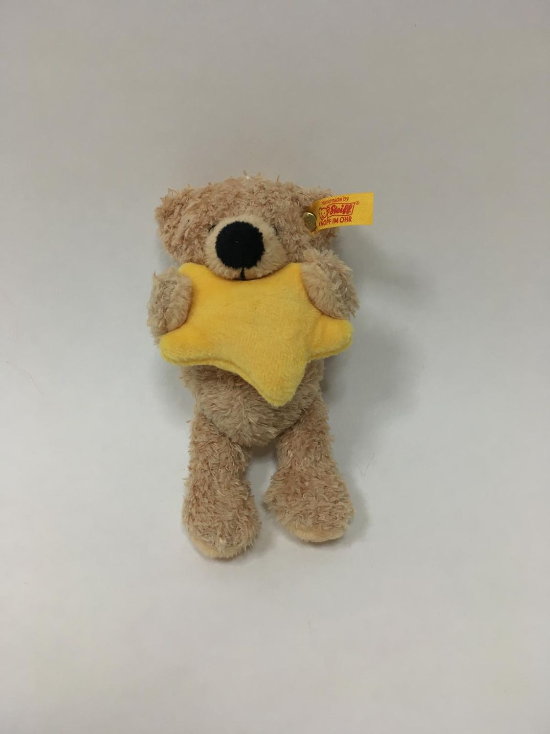 Steiff Teddy Fynn mit Stern 901249 mit Knopf und Fahne stehend 12 cm selten