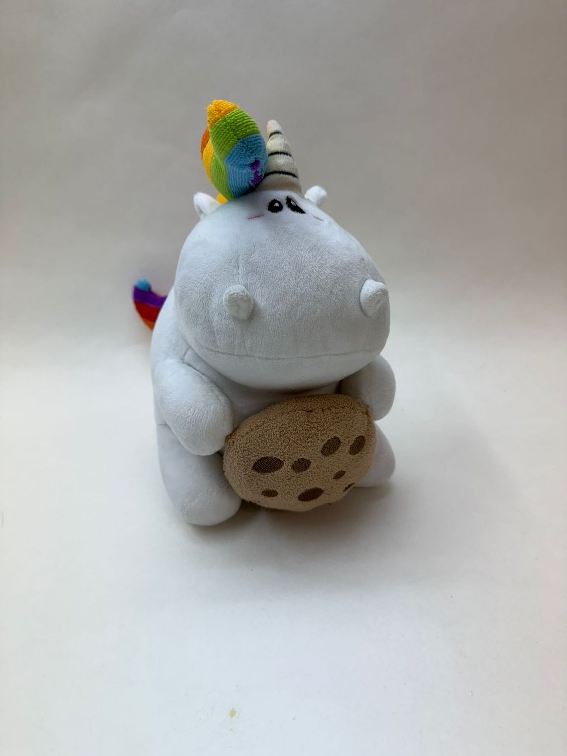 Einhorn Pummeleinhorn mit Keks sitzend 28 cm Sammlerstück