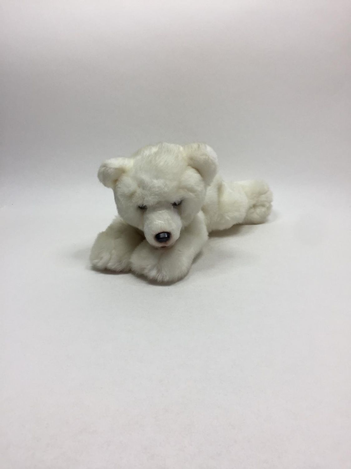 Eisbär Uni-Toys liegend 30 cm Mega Sammlerstück