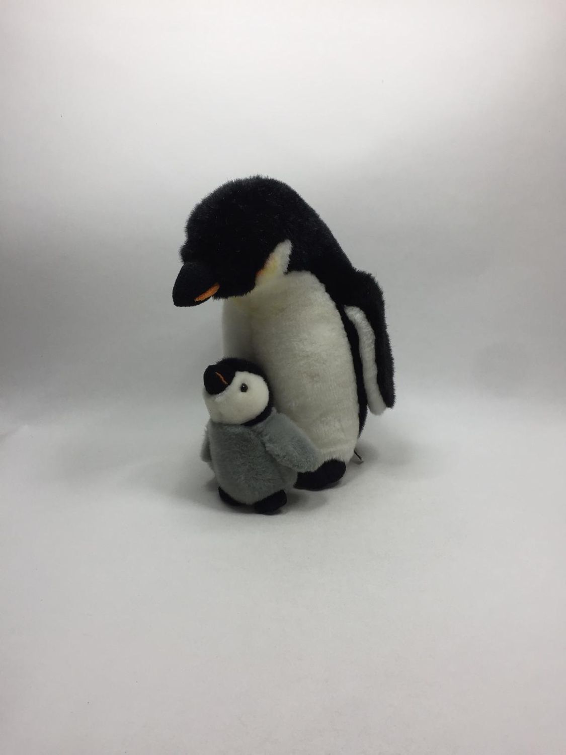 Pinguin mit Baby Uni-Toys stehend 35 cm sehr selten
