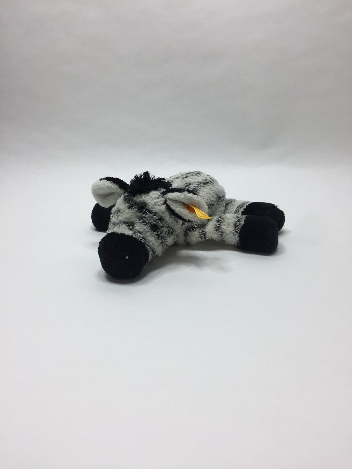 Steiff Zebra 087820 mit Knopf und Fahne liegend 30 cm Rarität