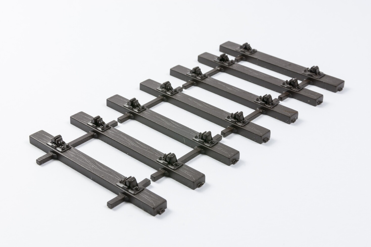 SLEEPERS  WITH RAIL CHAIRS 7MM 8&#39;6 TRACK BASES PACK OF 4