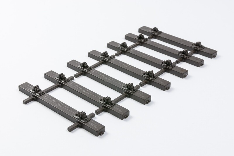 SLEEPERS  WITH RAIL CHAIRS 7MM 8&#39;6 TRACK BASES PACK OF 4