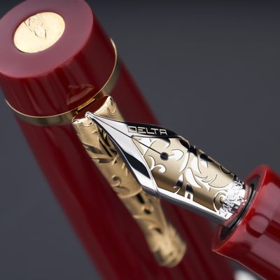 Delta Bio+16 - Corallo "P" Fountain Pen Coral; Piston; Gold Trim; two tone steel nib