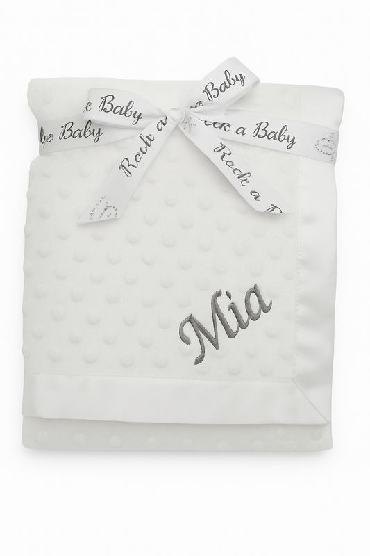 White satin edge dimple blanket