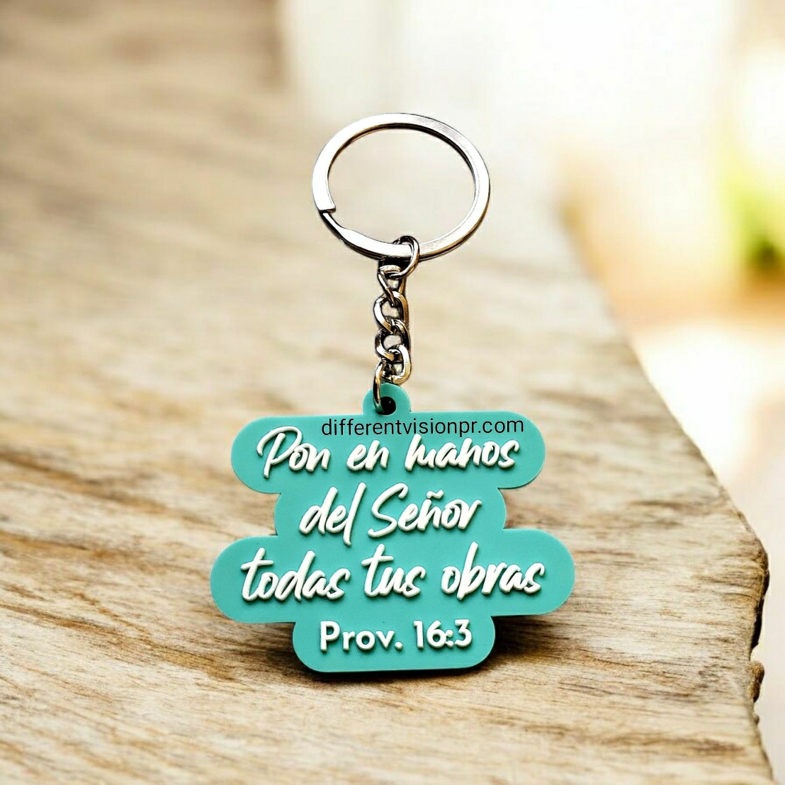 Llavero de caucho cian - En las manos del Señor