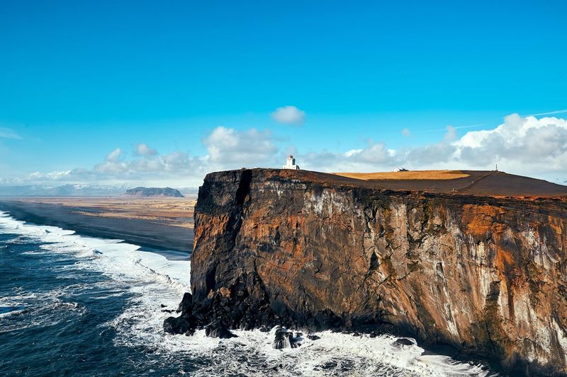 Dyrhólaey Lighthouse af fotograf Theis Bothmann | ARTHENTIC Akustikbillede