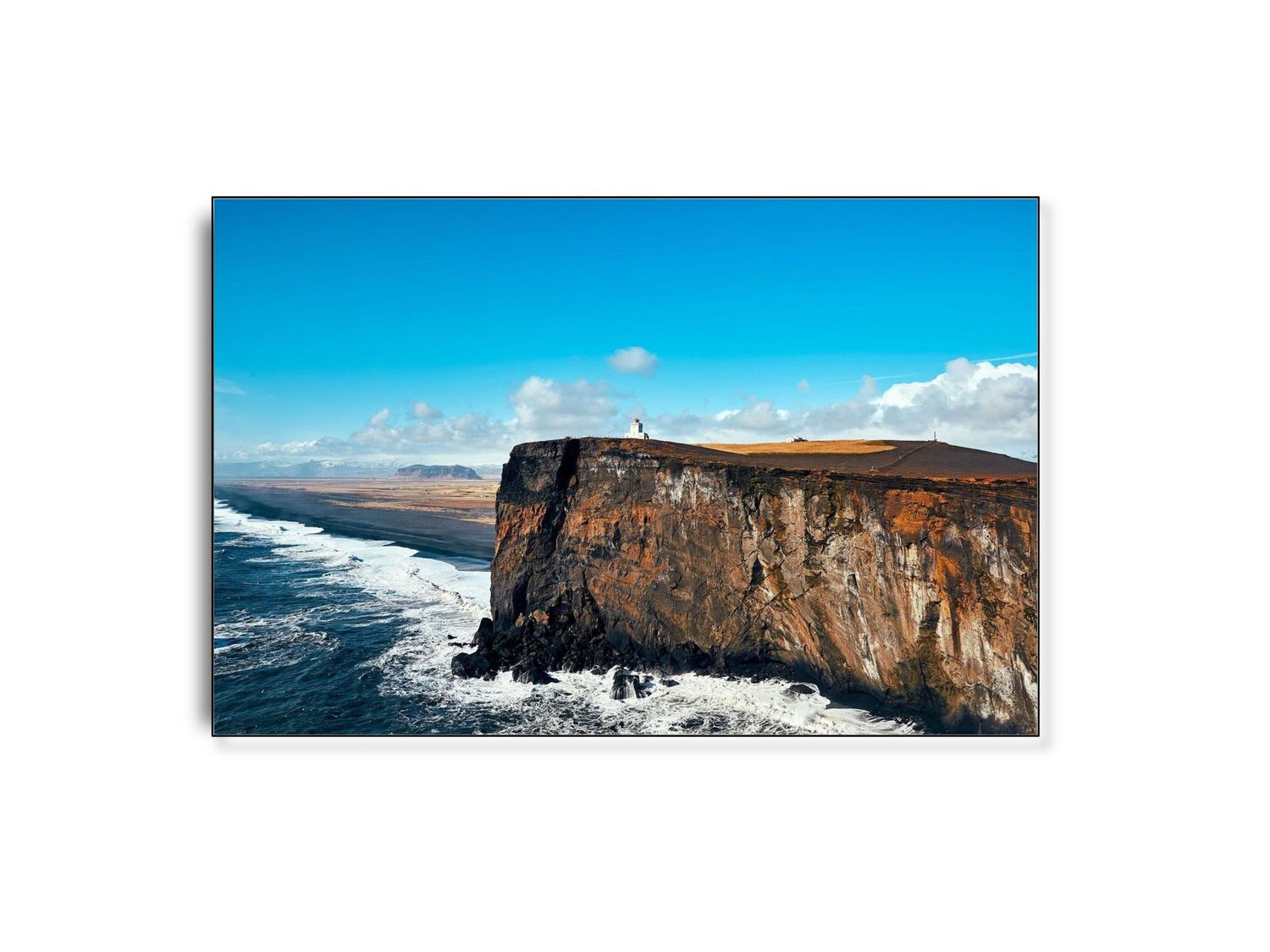 Dyrhólaey Lighthouse af fotograf Theis Bothmann | ARTHENTIC Akustikbillede