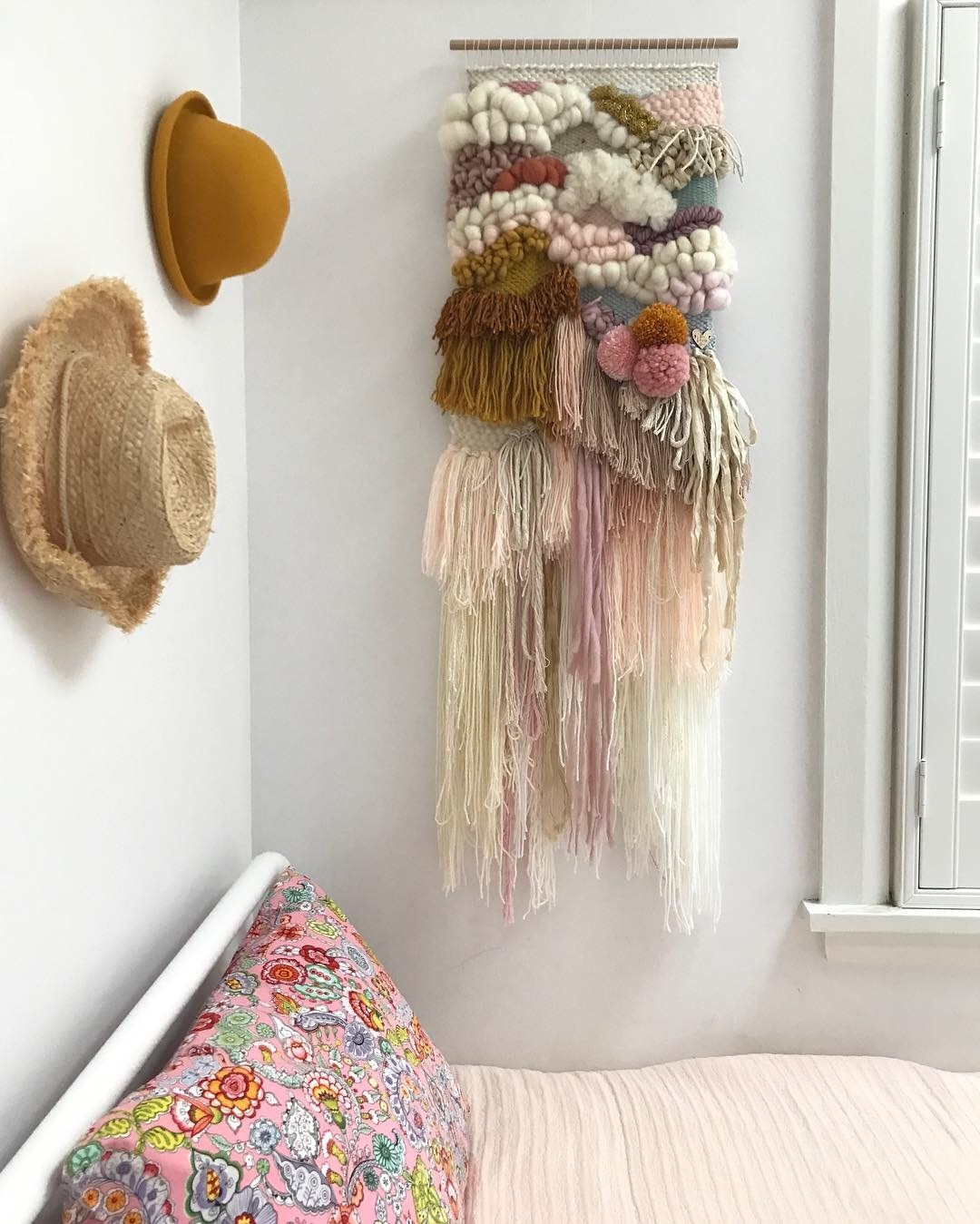 Medium woven wall hanging 40 cm wide.