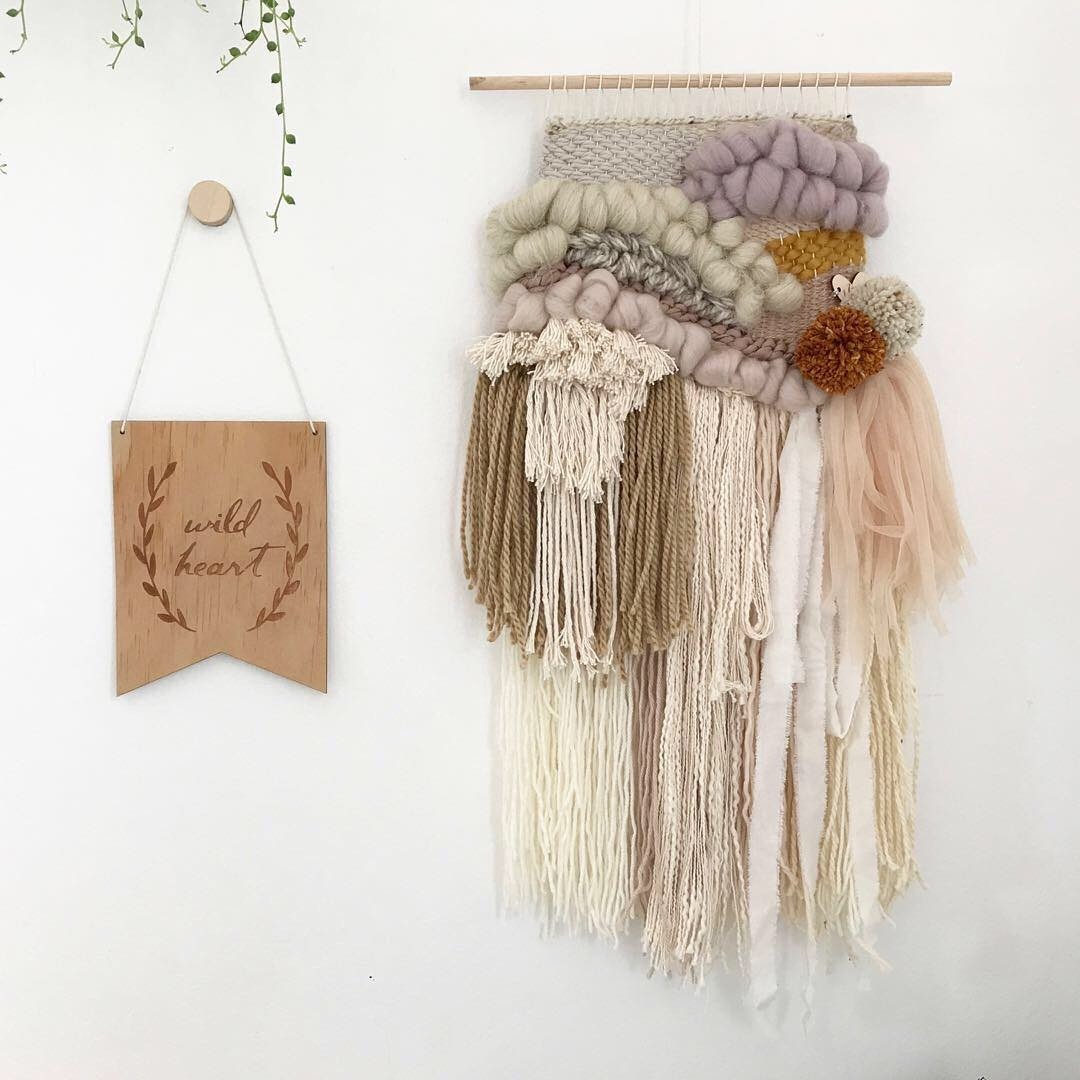 Medium woven wall hanging  30 cm wide.