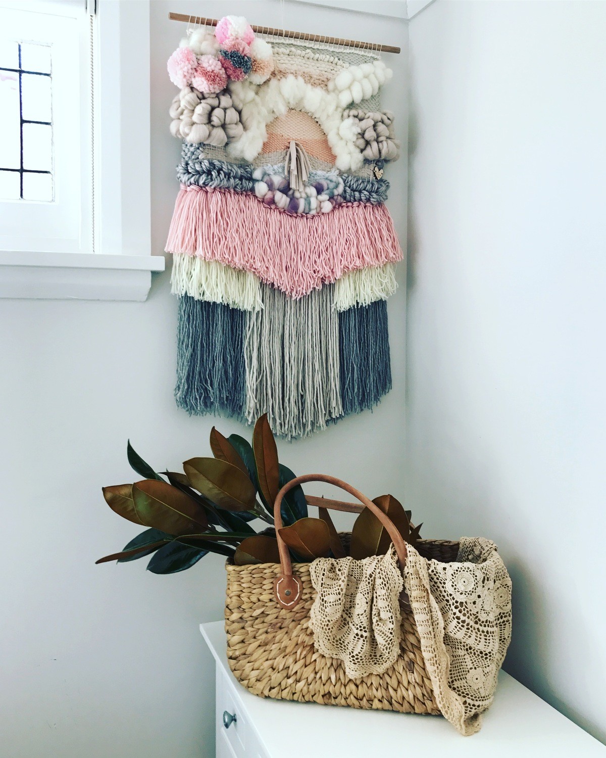 Medium woven wall hanging  30 cm wide.