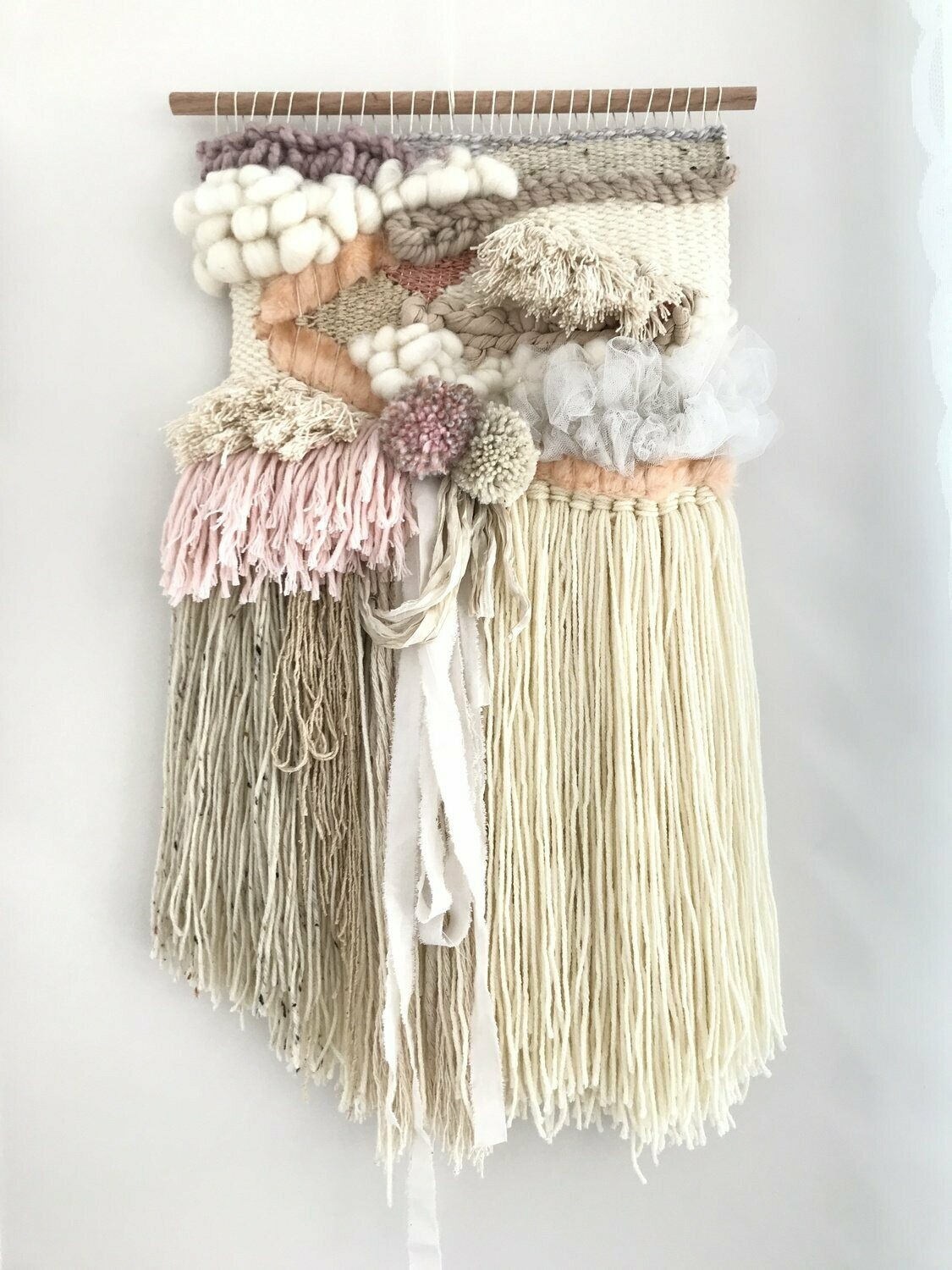 Medium woven wall hanging  30 cm wide.