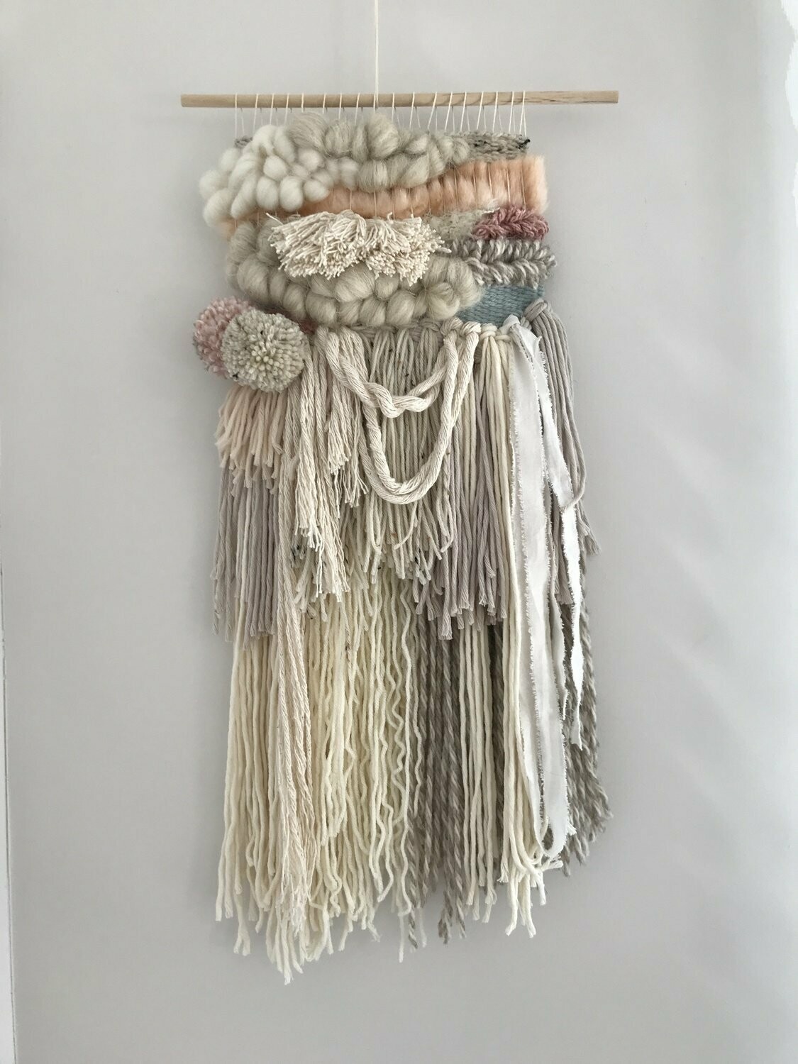 Small woven wall hanging 20 cm wide.
