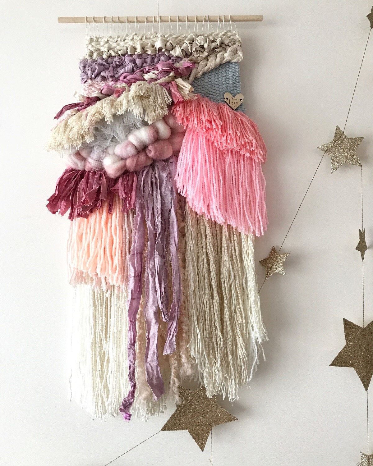 Small woven wall hanging 20 cm wide.