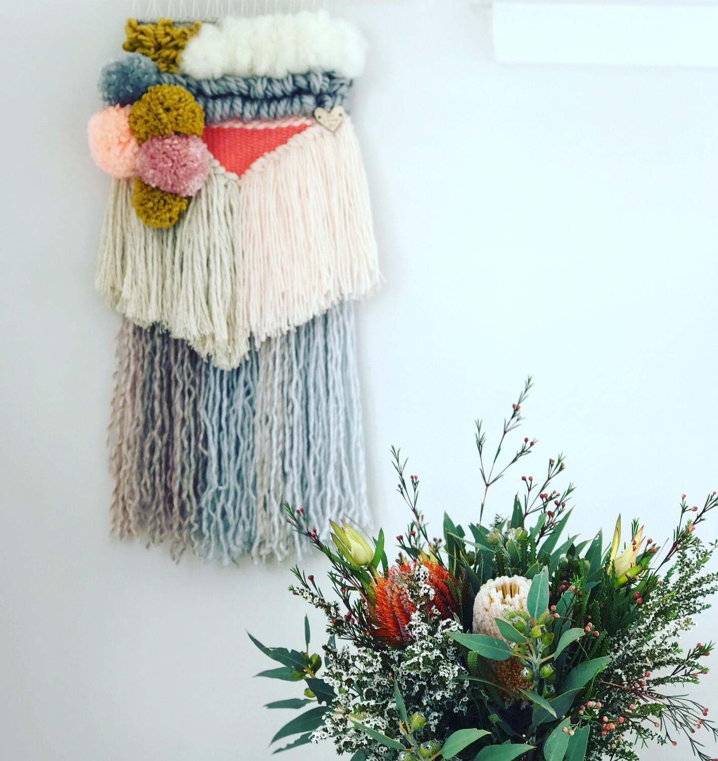 Small woven wall hanging 20 cm wide.