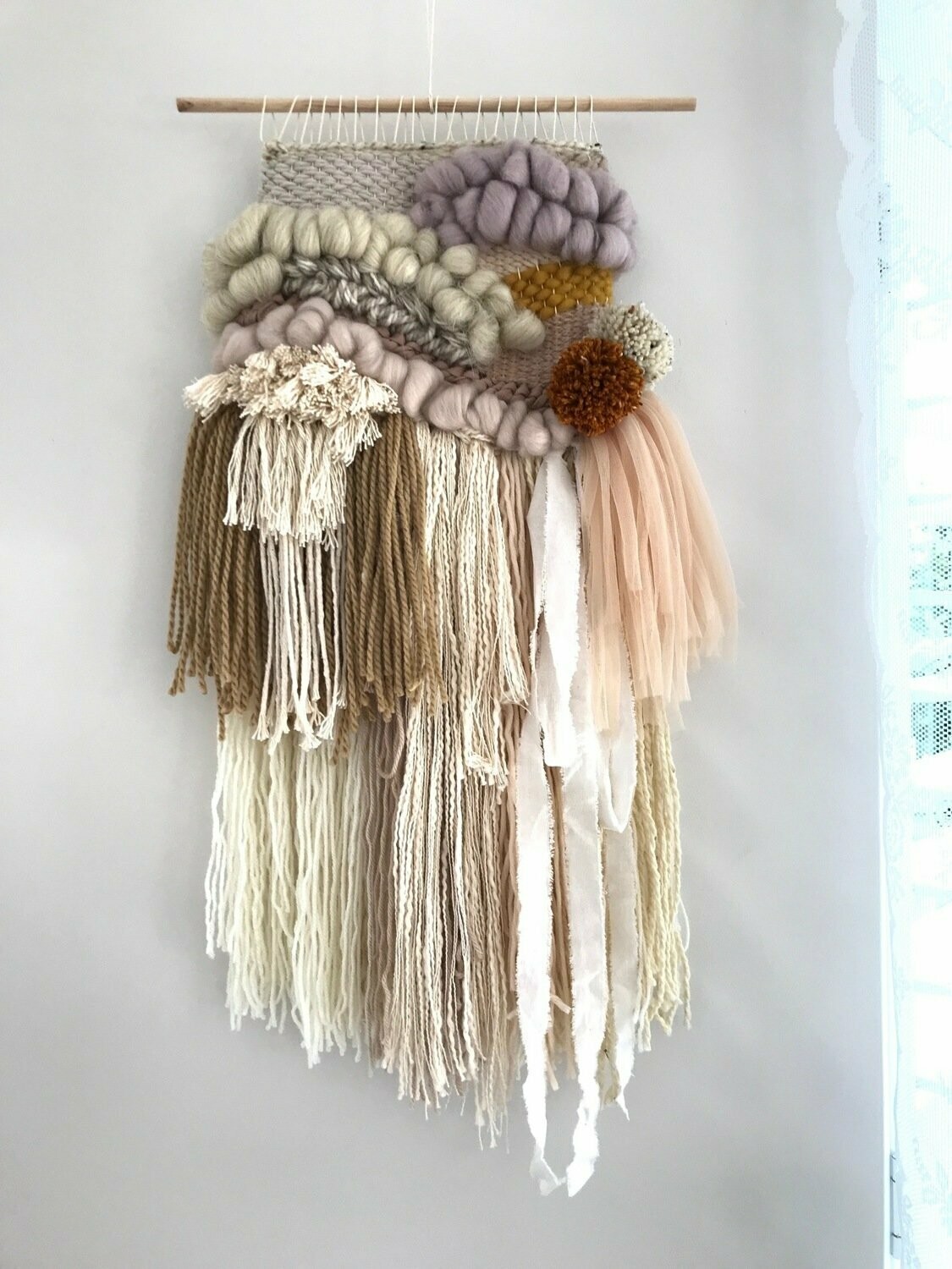 Small  woven wall hanging 25 cm wide.