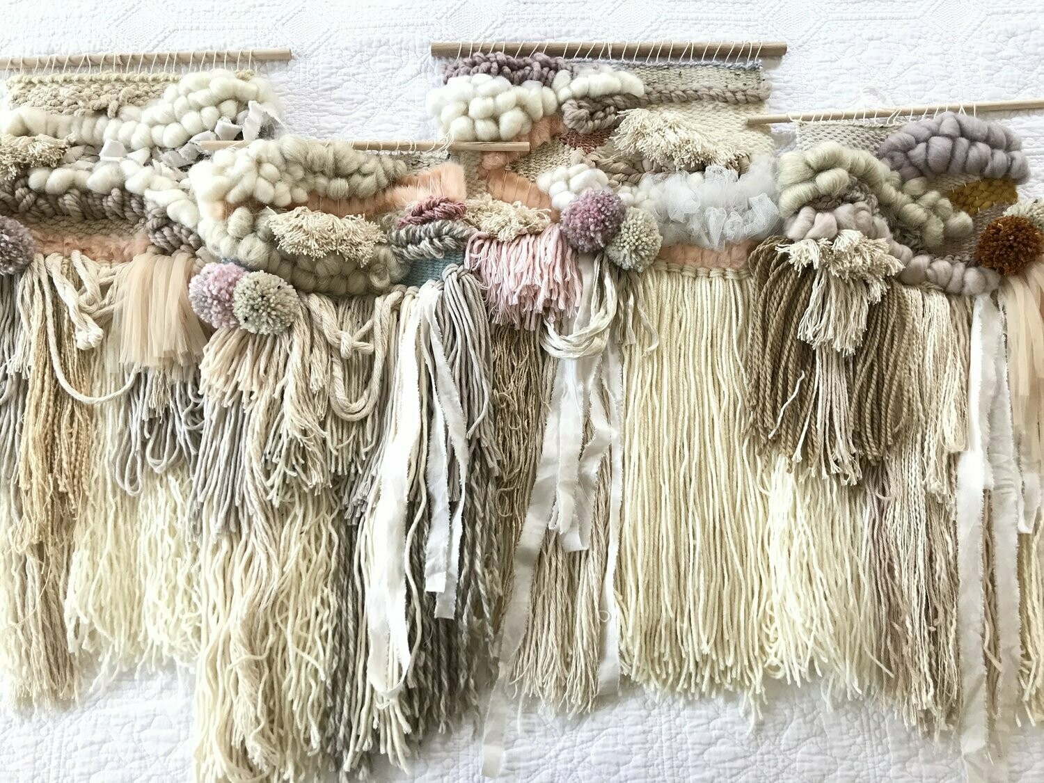 Small  woven wall hanging 25 cm wide.