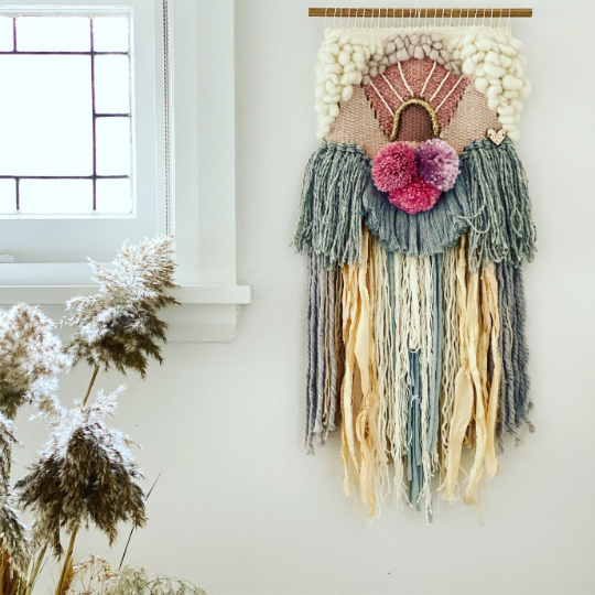 Medium woven wall hanging  30 cm wide.