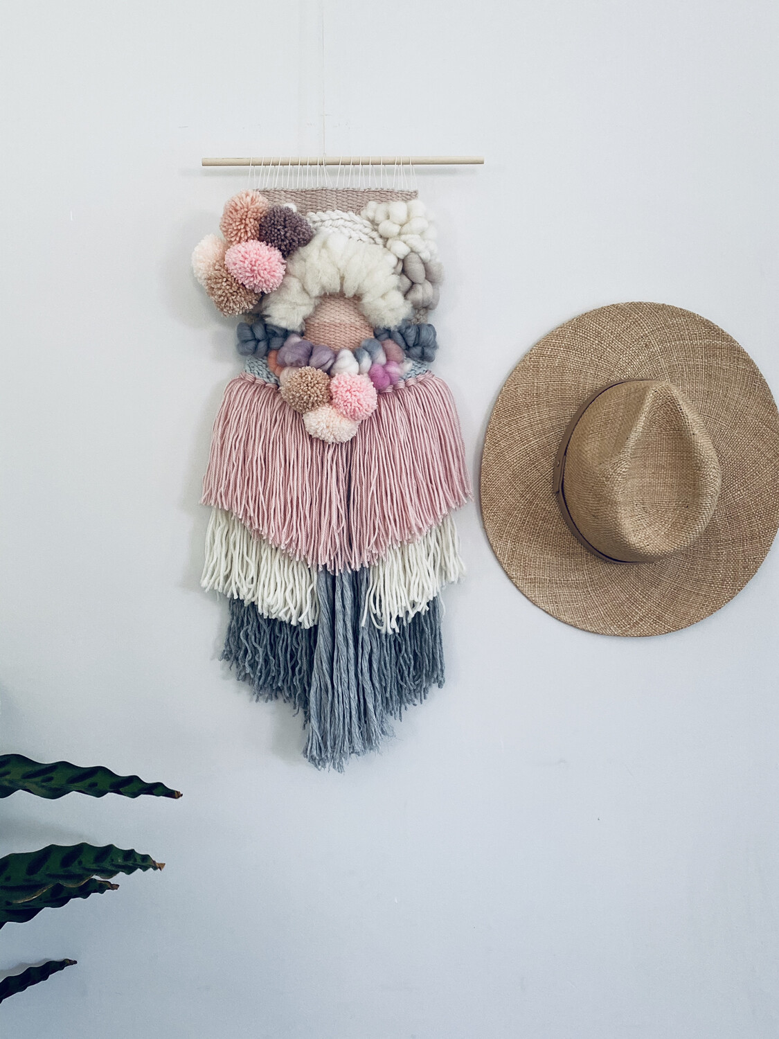 Small woven wall hanging 20 cm wide.