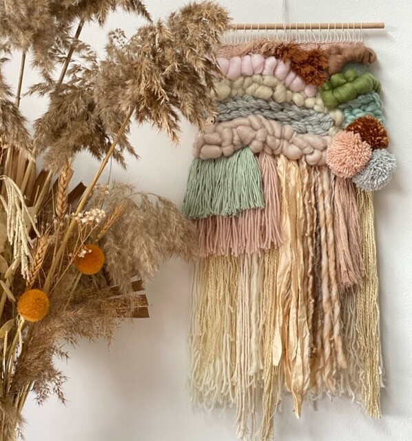Small  woven wall hanging 25 cm wide.