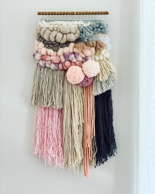 Small  woven wall hanging 25 cm wide.