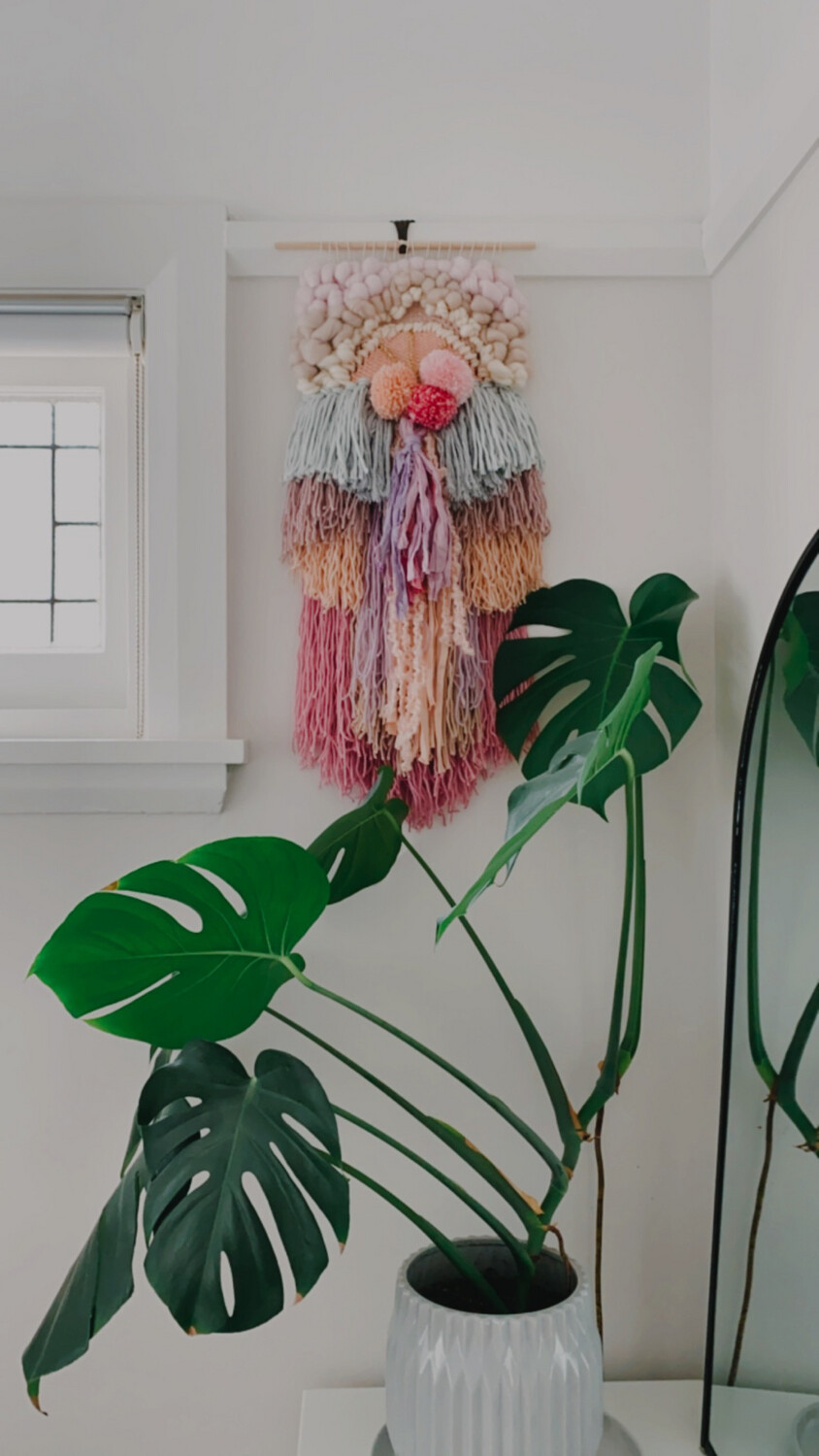 Small woven wall hanging 20 cm wide.