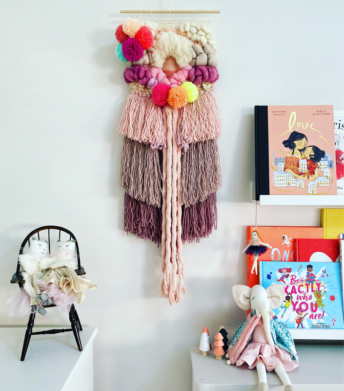 Small woven wall hanging 20 cm wide.