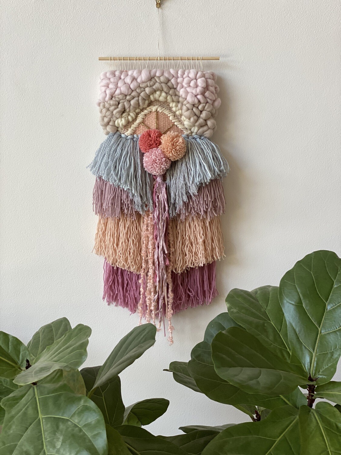 Small  woven wall hanging 25 cm wide.