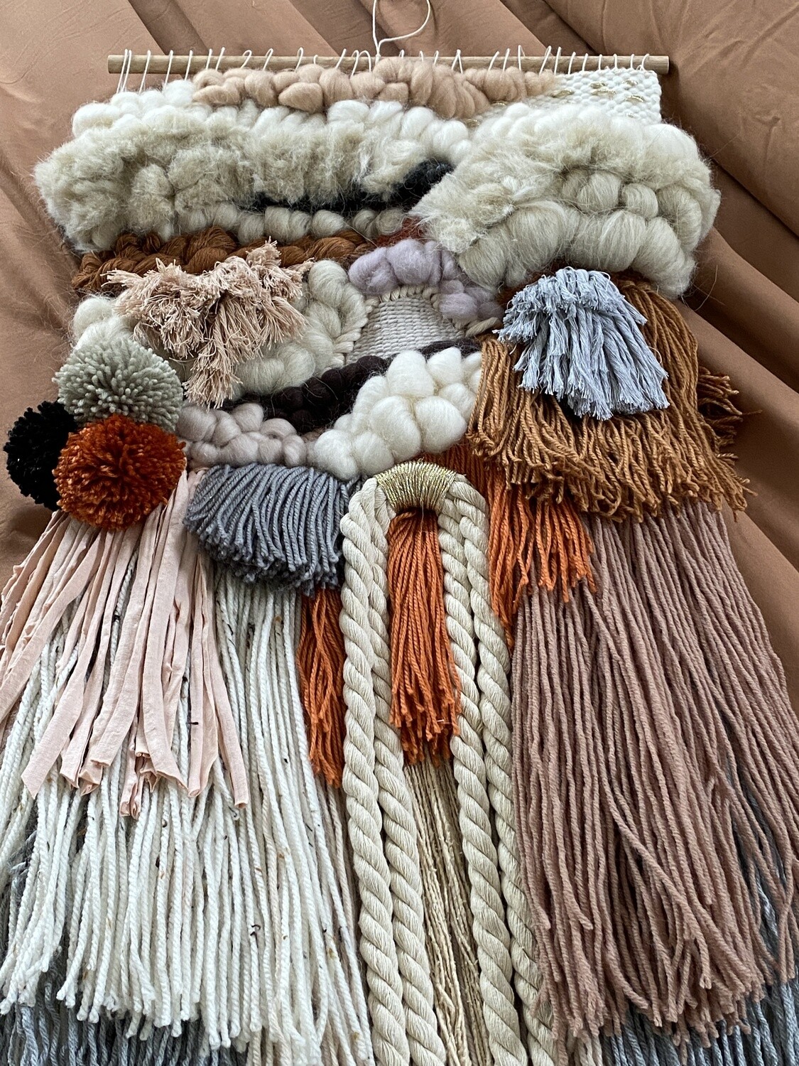 Medium woven wall hanging  30 cm wide.