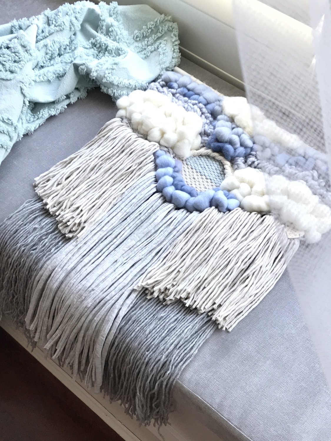 Medium woven wall hanging  30 cm wide.