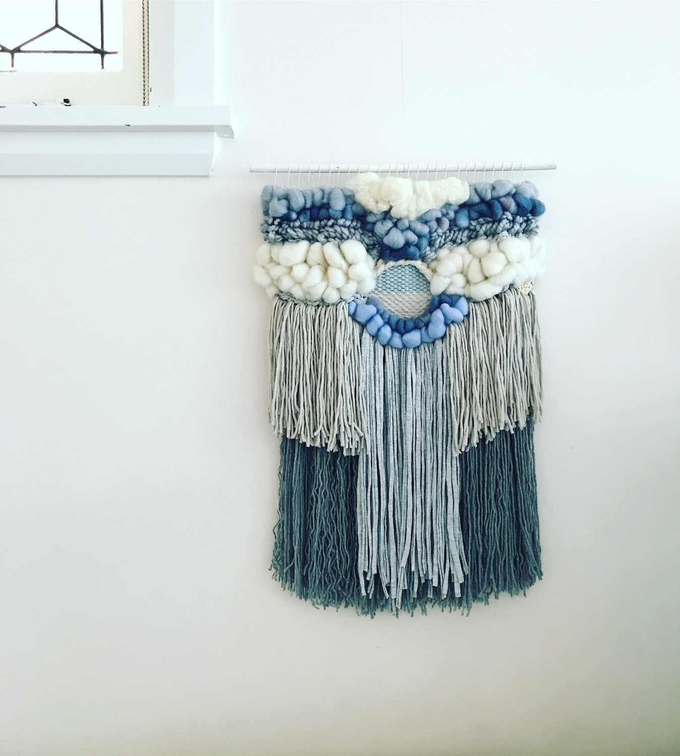Medium woven wall hanging  30 cm wide.