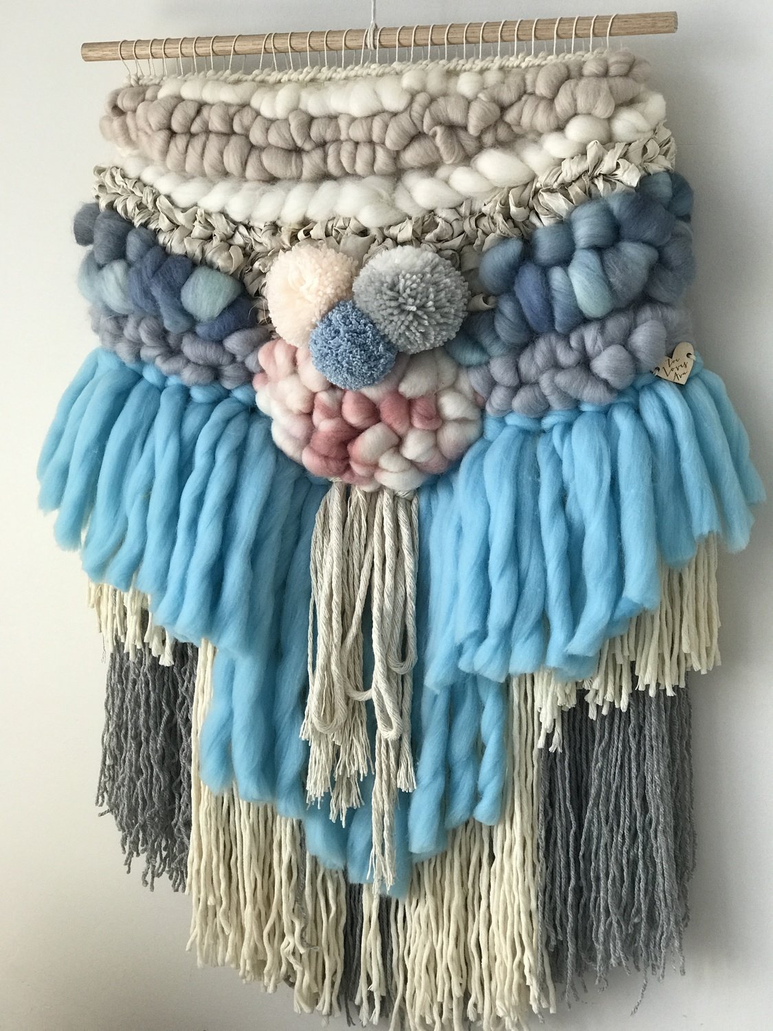 Medium woven wall hanging 40 cm wide.