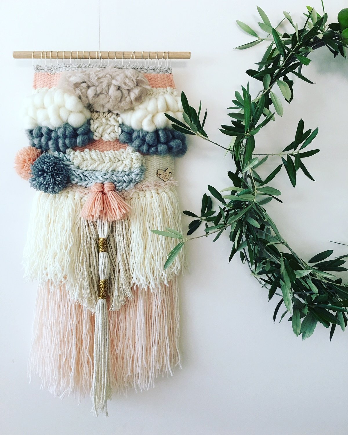 Small woven wall hanging 20 cm wide.