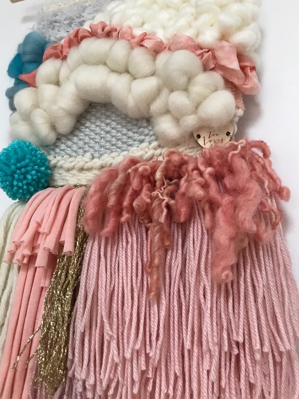 Small woven wall hanging 20 cm wide.