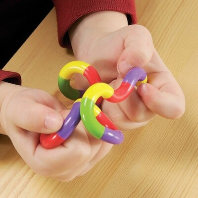 Hands playing with a twisty fidget toy.
