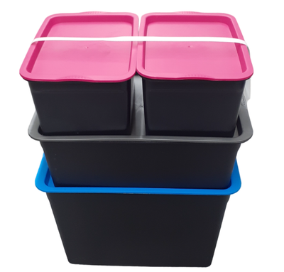 A collection of black plastic sensory tub boxes.