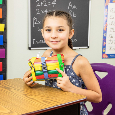 Image of girl holding a Thingamajig toy 