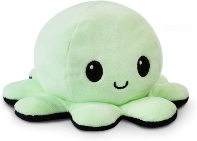 Image of smiling TeeTurtle glow in the dark reversible plushie
