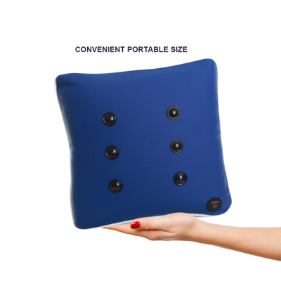 Image showing a hand holding the square massage cushion