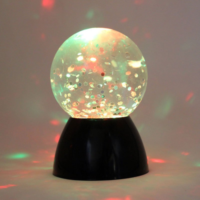 Image of sensory glitter waterball lamp lit in white