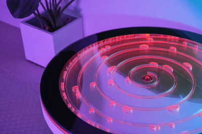 Close-up view of the maze bubble table lit in red