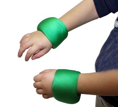 Image showing a child's arms with a weighted wrist band on each arm