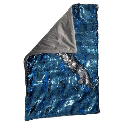 Sequin weighted lap pad with one corner folded over