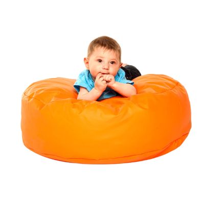 Image of a baby on a small orange pouf