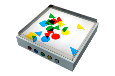 Top view of the light table with sand table top lit in white