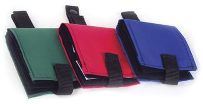 Green, red and blue folded books, secured with velcro fasteners
