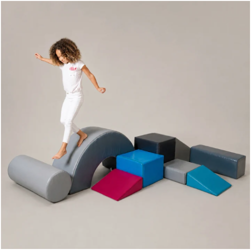 Image of child walking on part of the OT starter 9 set.