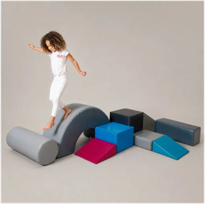 Image of child walking on part of the OT starter 9 set.