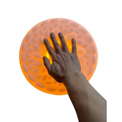 Image showing a hand activating the a single DoReMi tile.