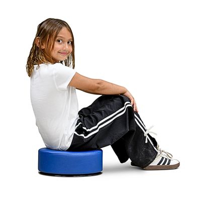 Image of child sitting on a soft twisty floor seat